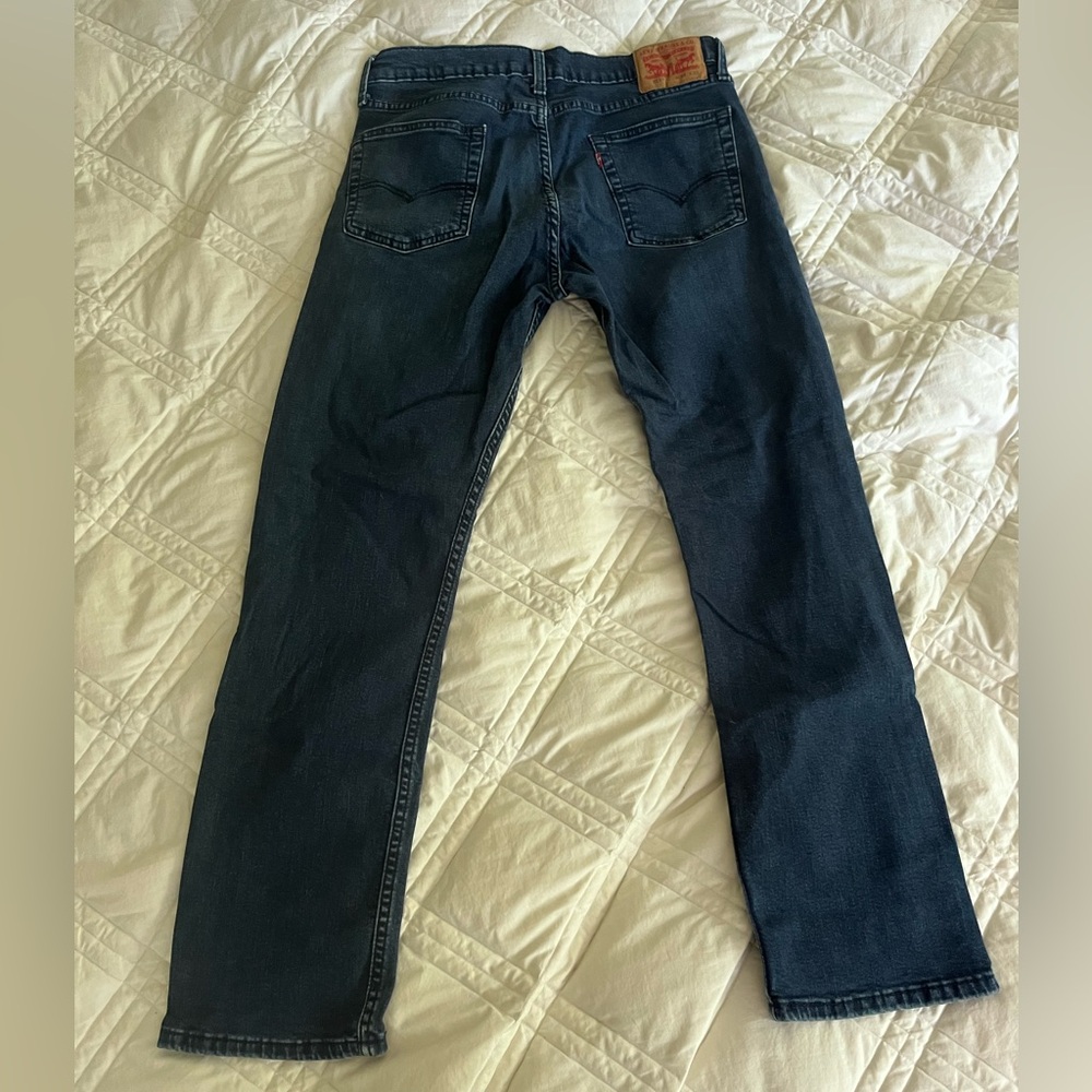 Levi’s 513. 34” waist, 32” inseam. Dark blue.